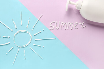 Word SUMMER with sun made of sunscreen cream on color background