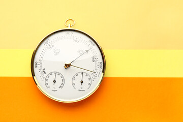 Aneroid barometer on colorful background