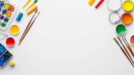 Colorful Art Supplies Surrounding White Space - Brushes, Paints, and Palettes Organized For Creativity