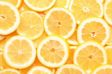 Obraz premium Texture of sliced lemons as background