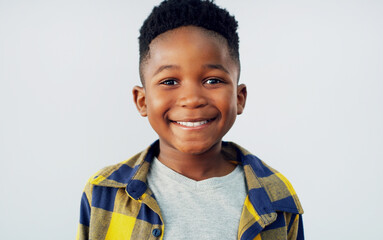 Portrait, smile and black child in studio for fashion, excited and summer fun. Young kid, happy and...