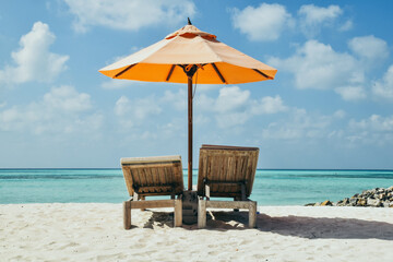 beach chairs and umbrella