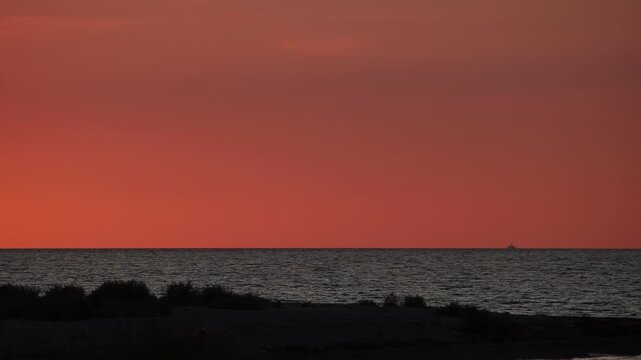 Sonnenuntergang am Urlaubsstrand