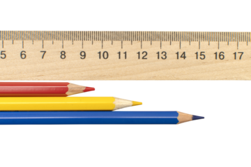  Colored pencils and school wooden measuring ruler isolated