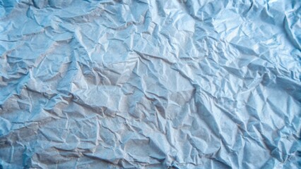 Obraz premium Close-Up of Crumpled Light Blue Tissue Paper