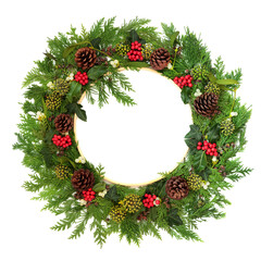 Winter Christmas green wreath of cedar fir, holly, mistletoe, berries, ivy leaf on white background...