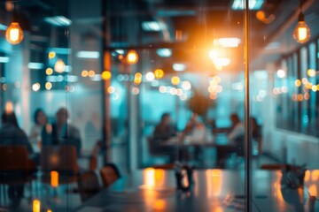 View of a office through blurred glass with professionals in meeting