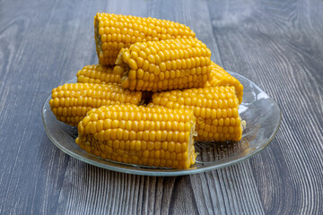 Boiled fresh corn on a plate.