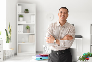 Portrait of male accountant in office