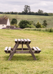 Picnic Benches Amongst The Rolling Cotswolds Hills