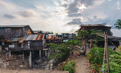 Life amidst challenges in a philippine slum community surrounded by poor living conditions and pollution