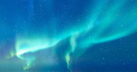 Northern lights or Aurora borealis in the sky - Tromso, Norway