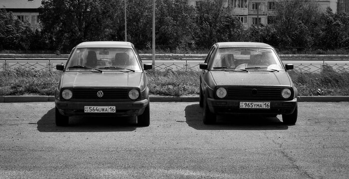 kazakhstan, Ust-Kamenogorsk, may 5, 2024: Volkswagen Golf Mk2. Two cars. Black and White