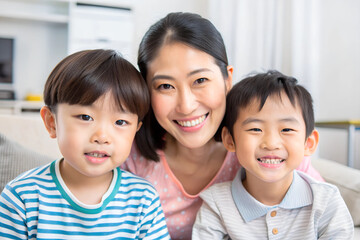 Portrait of mother with her daughters in the home environment