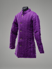 Historical fashion. Medieval knight cloth. Padded jacket gambeson.