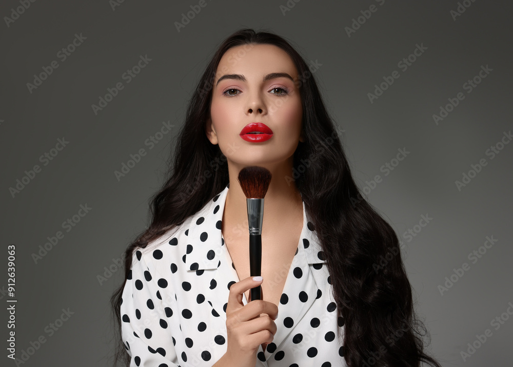 Poster Beautiful makeup. Attractive woman with brush on grey background