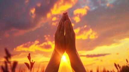 .woman hands praying for blessing from god on sunset background.