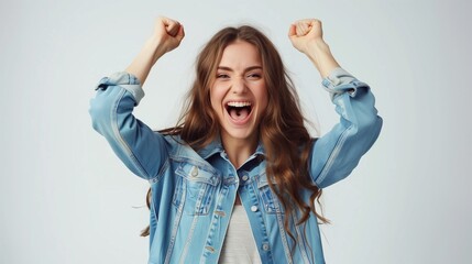 Exultant young woman celebrating getting a job.