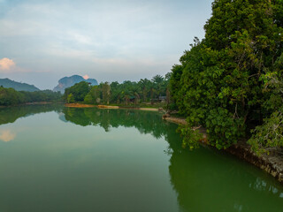 Landscape Aerial view of majestic clouds in the sky sunset or sunrise over sea with reflection in the tropical sea.Beautiful landscape scenery.Amazing light of nature Landscape nature background