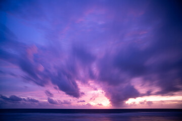 Obraz premium Landscape Aerial view of majestic clouds in the sky sunset or sunrise over sea with reflection in the tropical sea.Beautiful landscape scenery.Amazing light of nature Landscape nature background