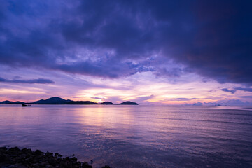 Landscape Aerial view of majestic clouds in the sky sunset or sunrise over sea with reflection in the tropical sea.Beautiful landscape scenery.Amazing light of nature Landscape nature background