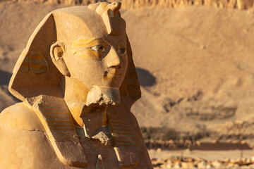 The weathered face of the Sphinx gazes across the sands of time, its enigmatic expression hinting...