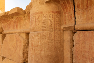 The weathered columns and statues of Hatshepsut's funerary temple are a testament to the grandeur...