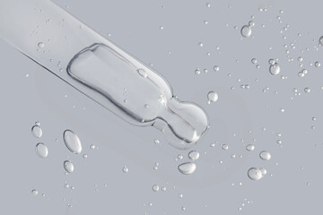 Liquid gray gel or serum gray transparent on a screen of microscope white isolated background