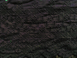 Intricate black floral self embroidery with cutwork dots on cotton fabric