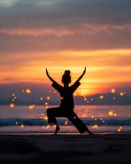 Fototapeta premium A silhouette of a young person practicing yoga on a beach at sunset, with calm waves and glowing particles in the air