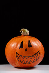 Halloween pumpkin on a black background. Halloween Sale