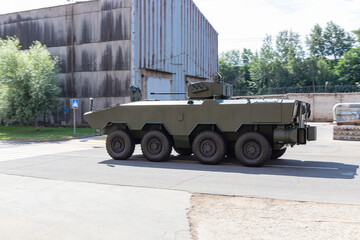 Testing of a military vehicle on wheels on the territory of the plant