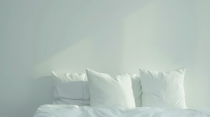 A cozy bed with white sheets and pillows bathed in soothing natural light, capturing a moment of serene simplicity and comfort.