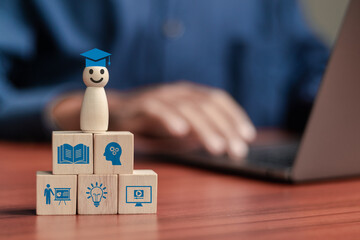 e-learning icons on wooden blocks, learning online with webinar, video tutorial, internet lessons.