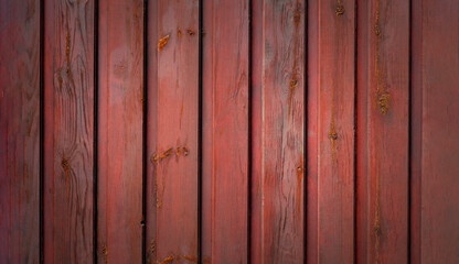 Naklejka premium Red wooden wall, vertical wooden panels