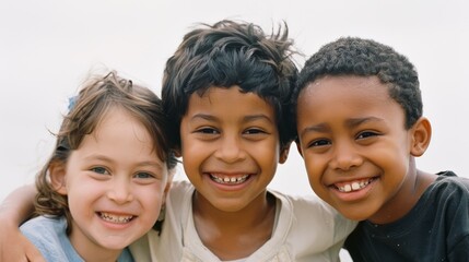Fototapeta premium A trio of joyful children, closely bonded with broad smiles and bright eyes, celebrating the essence of youthful camaraderie.
