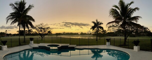 Sunrise over swimming pool