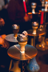 Colorful hookah on bokeh background close up