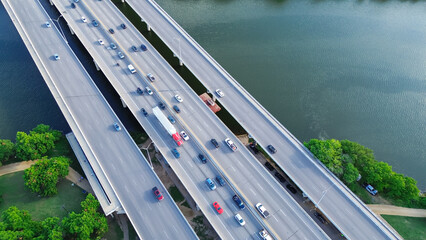 Busy traffic on river bridge Interstate Highway 35 across Colorado River near downtown Austin,...