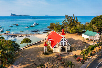 Red church at Cap Malheureux village, Mauritius Island. Notre Dame de Auxiliatrice, rural church...