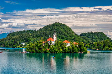Lake Bled in Slovenia. Beautiful mountains and Bled lake with small Pilgrimage Church. Bled lake...