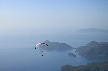 paraglider over the dead sea, fethiye