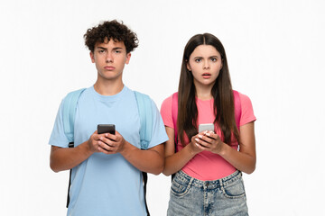 Sad angry high school pupils students teenagers classmates boy girl friends in casual clothes with...