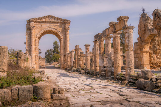 The Tyre necropolis triumphal arch and the road with columns, at UNESCO archeological historic site, in Sour, Lebanon.
