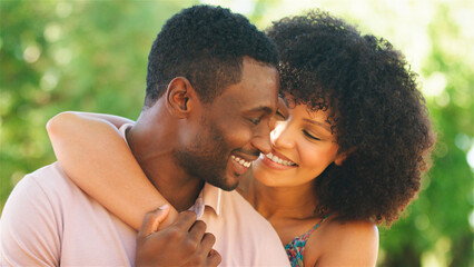 Romantic Couple Embracing in Nature During a Sunny Afternoon