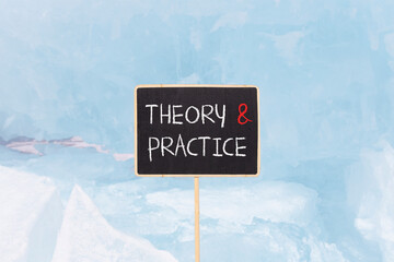 Theory and practice symbol. Concept words Theory and practice on beautiful yellow black blackboard....
