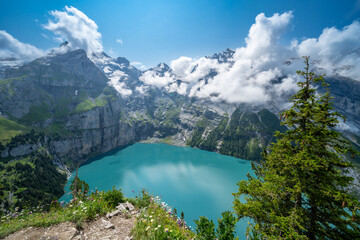 Oeschinensee Lake hike in Switzerland, near Kandersteg in the Swiss Alps