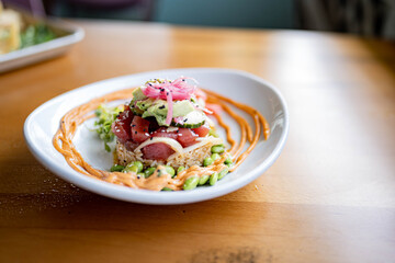 Tuna Poke Rice tower at gourmet beachfront restaurant 