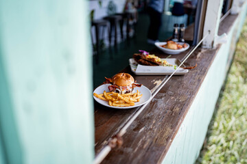 Menu items at gourmet restaurant sitting on bar at the beach