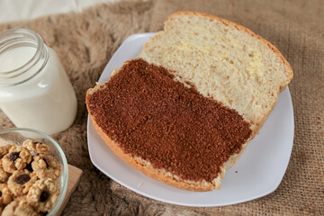 Bread with choco and butter on a plate for breakfast	
